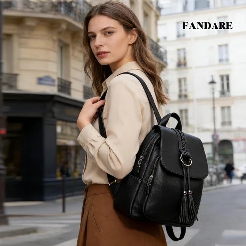 Vista 2 de FANDARE Mochila vintage para mujer con borla, mochila de cuero PU para mujer, Negro, Grande