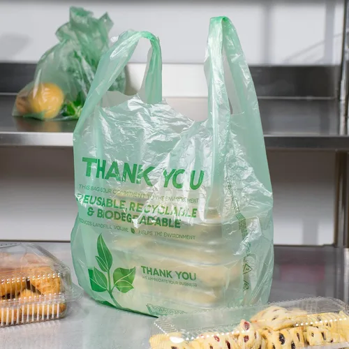 Vista 4 de KitchenDine Bolsas de plástico ecológicas verdes – 100 bolsas de compras biodegradables – Thank You – Bolsa de transporte de 22 x 12 pulgadas (100)