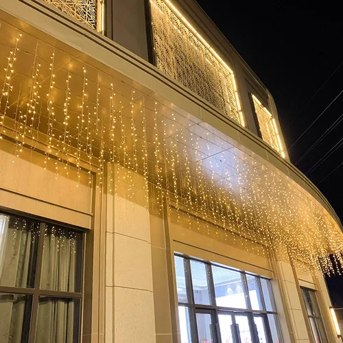 Vista 4 de Luces LED de carámbano de Navidad, 13 pies, 96 luces de hadas LED en cadena, cortina extensible, 8 modos, luces colgantes parpadeantes novedosas