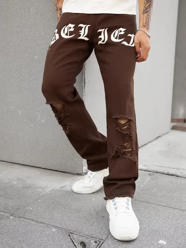 Vista 3 de WDIRARA Pantalones de mezclilla largos rasgados de cintura alta para hombre con bolsillo
