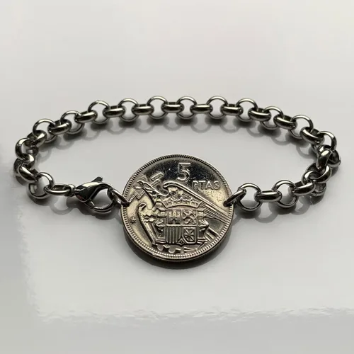 Vista 2 de 1957 España España Moneda 5 Pesetas Pulsera Hombre Águila de San Juan Escudo Español Madrid Barcelona Murcia Asturias Cataluña Las Palmas Vigo Gijón