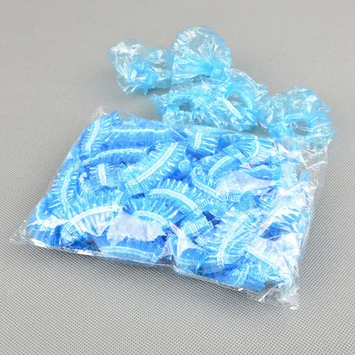 Vista 2 de 100 fundas desechables para los oídos para la ducha, protectores de oídos impermeables de plástico, gorras de ducha desechables para teñir el Azul