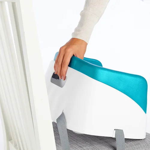 Vista 8 de Asiento elevador SmartClean Toddler Booster de Ingenuity para mesa de comedor con correas de arnés de 3 puntos, azul pavo real