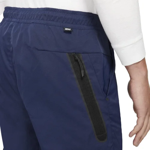 Vista 5 de Nike Sportswear Tech Essentials - Pantalones de viaje sin forro para hombre