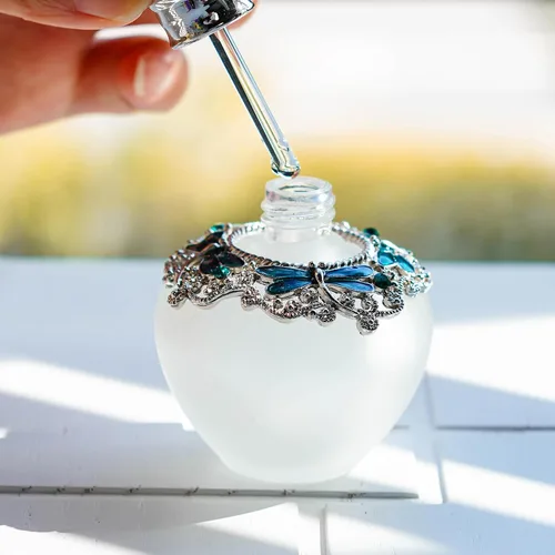 Vista 4 de YU FENG - Botella de perfume de cristal vacía de 40 ml con tapón de libélula verde, adornada con strass, rellenable, botella de vidrio