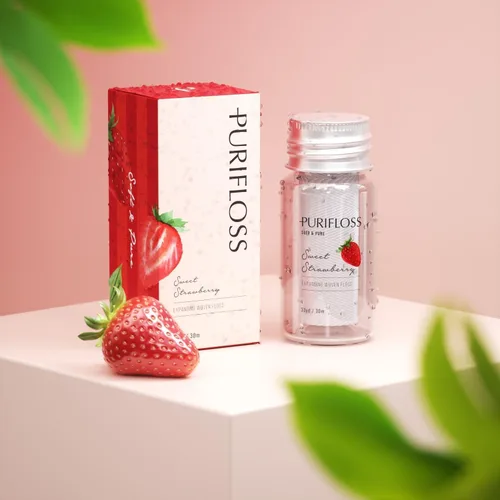 Vista 2 de Hilo dental tejido expansible de alta calidad, sin PTFE y PFAS, fresa dulce, ecológico, vegano, sin crueldad, recomendado por dentistas, apto