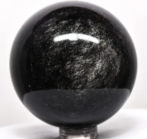 Vista 2 de Esfera de obsidiana brillante plateada de 2.1 pulgadas, bola mineral natural brillante de cristal volcánico, piedra preciosa pulida, México + soporte