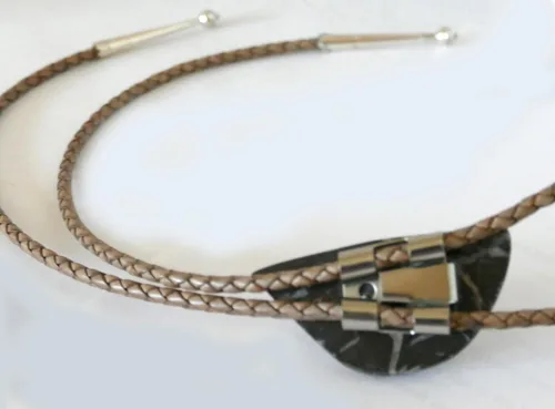 Vista 7 de Bolo Tie with an Irregular Shaped Piece of Maroon Jasper with Tan-Grey Lines "Chinese Writing" on Leather cord with Sterling Silver Tips