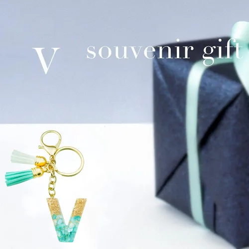 Vista 7 de Llavero de letra inicial del alfabeto de moda, llavero con borla, llavero para bolso, bolsos de mano para mujeres y niñas