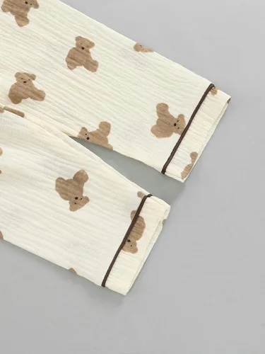Vista 6 de BULINGNA - Juego de pijama de dos piezas para niños, niño y niña, con botones, camiseta y pantalones cortos con diseño de oso, ropa de dormir