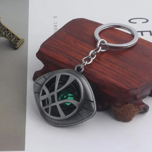 Vista 4 de QDDollars Llavero de ojo para hombre, llavero de amuleto de ojo celta para niños, tótem de ojo de piedra verde, llavero punk de mal de ojo