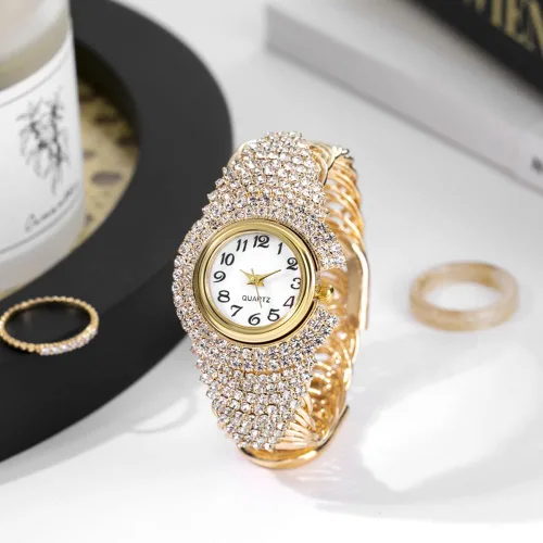 Vista 3 de Reloj de pulsera elegante de cristal para mujer, brazalete redondo, esfera analógica de cuarzo Dorado