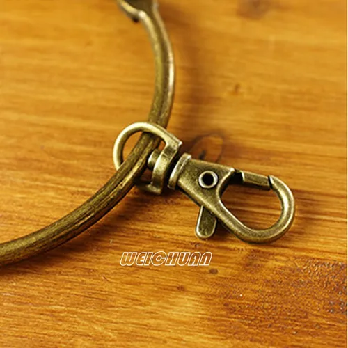 Vista 4 de WEICHUAN Llavero de metal de bronce antiguo, anillo circular grande con 10 anillos pequeños (paquete de 1)