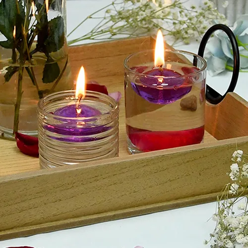 Vista 3 de Zest Candle Velas flotantes de 12 piezas, 1.75 pulgadas, gel morado transparente