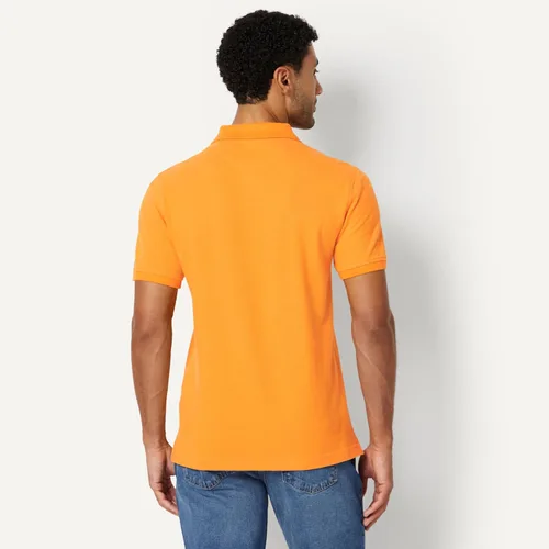 Vista 2 de Amazon Essentials Camiseta polo para hombre de manga corta y ajuste ajustado de algodón piqué Naranja Albaricoque