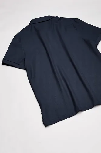 Vista 5 de Nautica playera polo clásica de mangas cortas, color sólido, para hombre