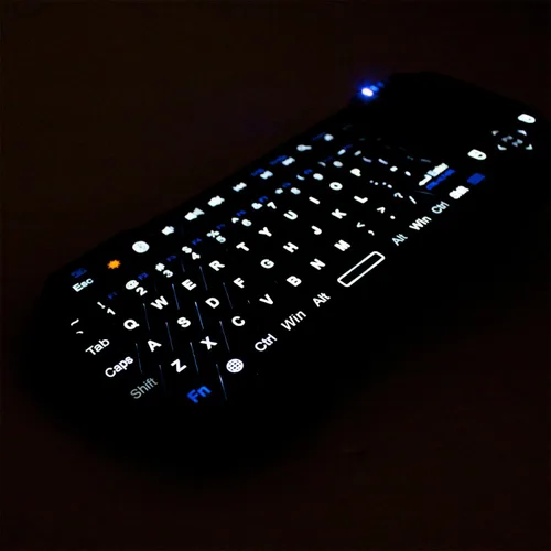 Vista 6 de Fosmon Mini teclado Bluetooth (teclado QWERTY), inalámbrico, portátil, con panel táctil, compatible con Apple TV, Amazon Fire Stick, PS4, PS4 Pro
