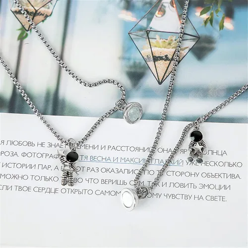 Vista 3 de Caiyao 2 imanes de atracción mutua de acero inoxidable para parejas, collar magnético de promesa de astronauta para mujeres, hombres, amigos, él