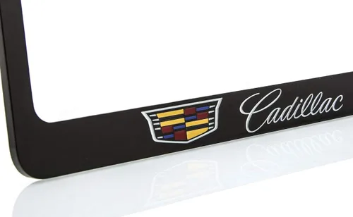 Vista 2 de Cadillac con Crest marco de matrícula de zinc con acabado negro brillante (2 agujeros)