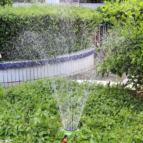 Vista 2 de STYDDI Aspersor de torreta de 8 patrones, aspersor de agua estacionario de 8 patrones en base decorativa de metal para riego de patios pequeños