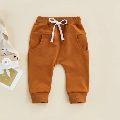 Vista 3 de Mubineo Pantalones deportivos básicos lisos para bebés, niños y niñas, cómodos pantalones de algodón con bolsillos