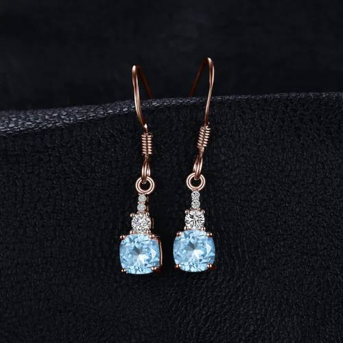 Vista 3 de JewelryPalace Aretes colgantes de topacio azul cielo genuino de 1.5 quilates para mujer, chapados en oro rosa blanco amarillo de 14 quilates, aretes
