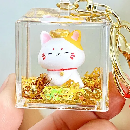 Vista 3 de HSYHERE Lindo gato feliz fortuna buena suerte gatito llavero de gato de la suerte llavero botella de arena móvil llavero coche llavero bolsa colgante