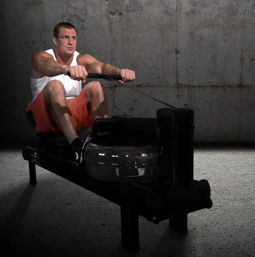 Vista 3 de WaterRower Máquina de remo de agua Gronk Fitness M1 Hi Rise Edición limitada Máquina de entrenamiento cardiovascular de bajo impacto Remo