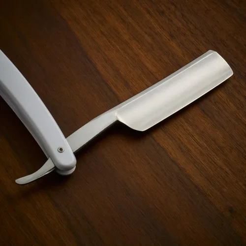 Vista 2 de Union Razors Maquinilla de afeitar SR2 de borde recto con mango blanco
