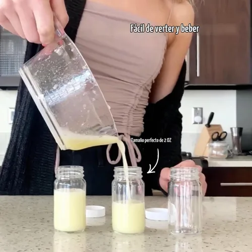 Vista 4 de Botellas de vidrio prémium con tapas, boca ancha, transparente, 2 onzas