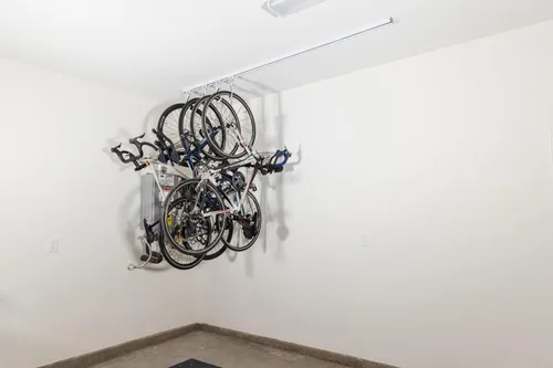 Vista 6 de E-Z Garage Storage Bike Slide Pro - Portabicicletas de techo, capacidad