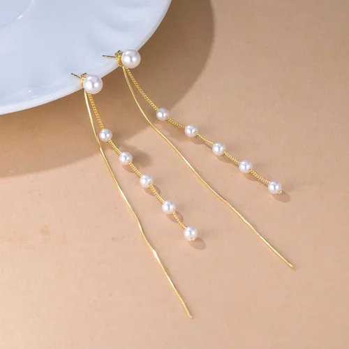 Vista 5 de SLUYNZ Aretes colgantes de plata de ley 925 con perlas de concha de imitación para mujer, elegantes aretes largos con borlas, aretes colgantes
