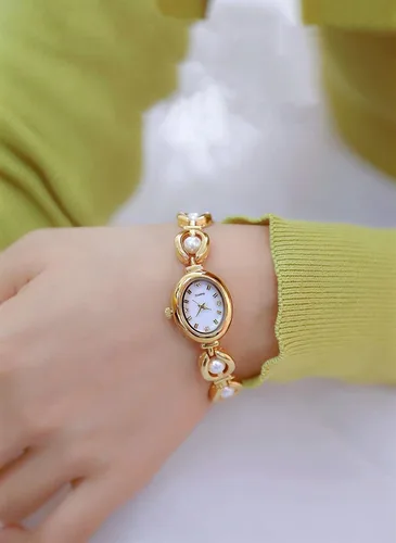 Vista 2 de ADSBIAOYE Elegante reloj de vestir de mujer perla reloj de moda oval dial regalo reloj impermeable para mujer