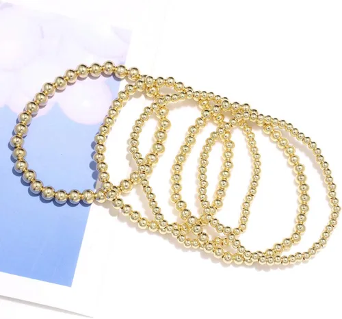 Vista 5 de ARATLENCH Pulsera de cuentas de oro para mujer, chapada en oro de 14 quilates, pulsera de cuentas de bola de cuerda elástica, pulsera de la amistad