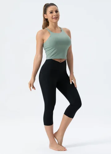 Vista 6 de THE GYM PEOPLE Leggings capri de entrenamiento con cintura cruzada en V para mujer, con control de abdomen, pantalones de yoga con bolsillos