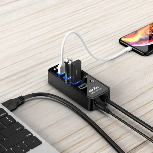 Vista 7 de Atolla Hub USB 3.0 de 4 puertos con 4 puertos de datos, 1 puerto de carga inteligente, interruptores individuales de encendido/apagado y adaptador