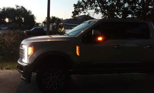 Vista 7 de iJDMTOY Kit de iluminación de fondo LED amarillo ámbar compatible con Ford F250 F350 F450 Super Duty 2017-2021 emblema cromado de guardabarros