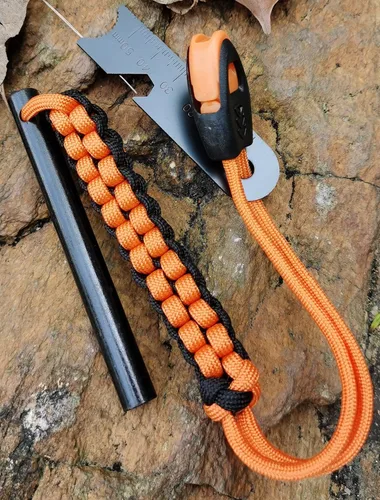 Vista 3 de FOSTAR - Barra de ferro perforada, acero pedernal de 4 pulgadas con mango de cordón de paracaídas, golpeador y silbato, para kits de supervivencia