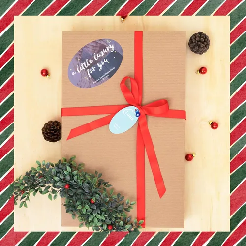 Vista 2 de Juego de toallas navideñas Luzia Color marfil Incluye 1 toalla de baño y 1 toalla de mano con diseños bordados y 2 toallas de baño lisas