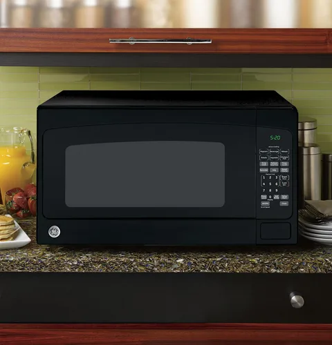Vista 4 de GE Horno microondas para encimera, capacidad de 1,200 vatios, 2.0 pies cúbicos, 8 ajustes de cocción de ajuste automático, tecnología de bloqueo