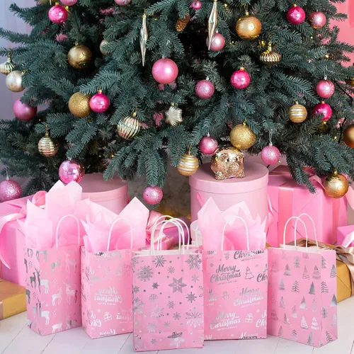 Vista 5 de Pasimy 24 bolsas de regalo de Navidad rosadas con papel de seda, bolsa de papel de dulces de Navidad rosa con lámina metálica plateada de copo