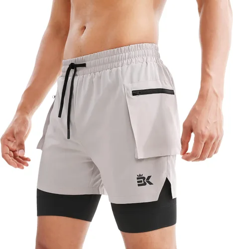 Vista 3 de BROKIG Pantalones cortos deportivos para hombre, con bolsillo en el muslo, pantalones cortos de gimnasio 2 en 1, ligeros, de secado rápido