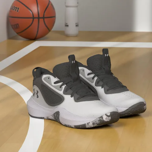 Vista 2 de Under Armour Lockdown 6 - Tenis de baloncesto unisex para adultos, Negro, marrón, blanco o gris