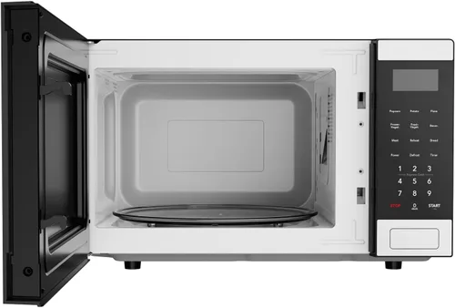Vista 9 de Microondas Frigidaire de 0.9 pies cúbicos, panel de control digital - Configuraciones de cocción automática - Bloqueo de seguridad para niños