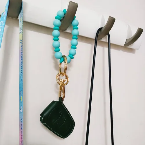 Vista 6 de Junyuerly Llavero de silicona con cuentas para mujer, pulsera elástica para llavero