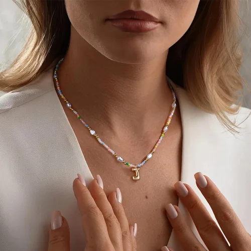 Vista 4 de Ritach - Regalos de Navidad para nietas, adolescentes y niñas, collar con inicial de perlas de colores claros, collar con dije de burbuja dorada