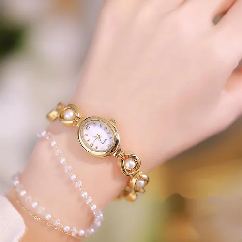 Vista 2 de BESTKANG Elegante reloj de pulsera vintage dorado para mujer, reloj de cuarzo con esfera ovalada, reloj de pulsera impermeable para mujer