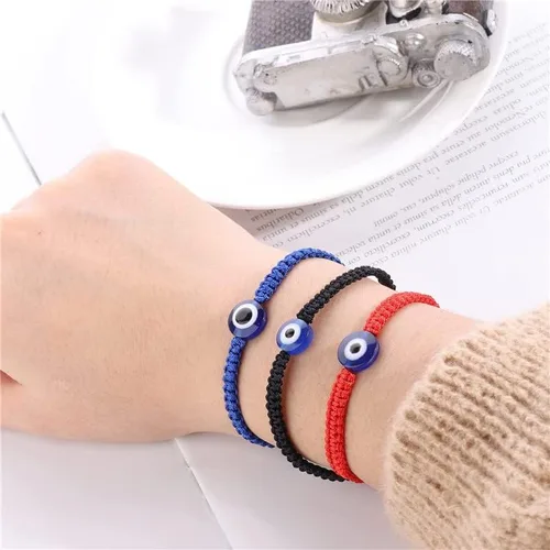 Vista 5 de Juego de 7 pulseras contra el mal de ojo, hechas a mano, ajustables, pulseras de protección Mal De Ojo Lucky Red Black String Elephant Sea Turtle