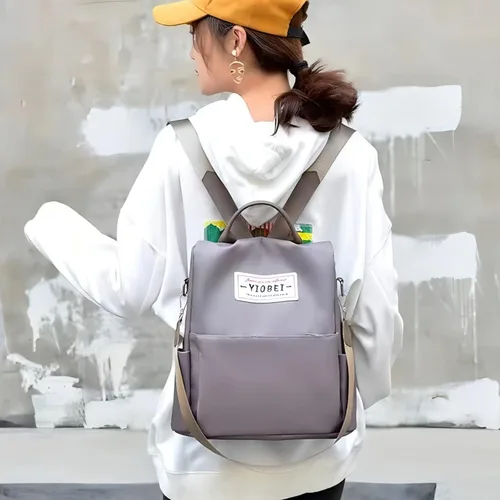 Vista 7 de CHARMORE Elegante mochila antirrobo para mujer, mochila de nailon impermeable casual para viajes, Gris-S