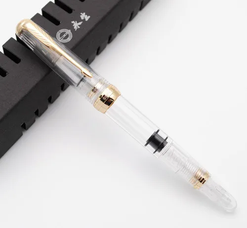 Vista 2 de czxwyst Pluma estilográfica 618 Toso Piston (transparente con clip dorado)